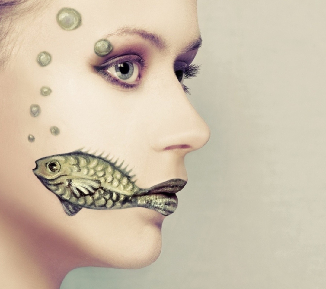 Fondo de pantalla Fish Face Art 1080x960
