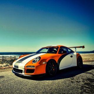 Kostenloses Orange Porsche 911 Wallpaper für iPad 2