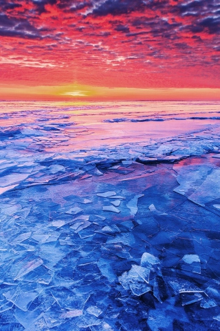 Sfondi Sunset And Shattered Ice 320x480