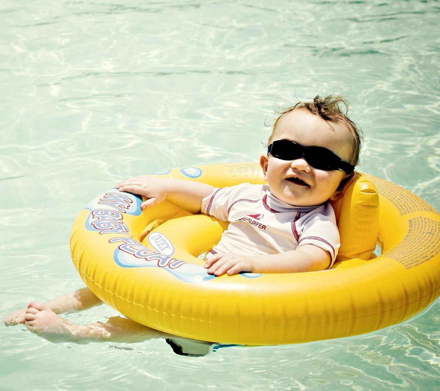 Cute Baby Boy Having Fun In Pool wallpaper 1440x1280