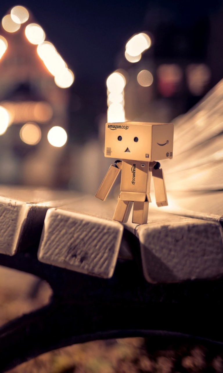 Das Danbo On Bench Wallpaper 768x1280