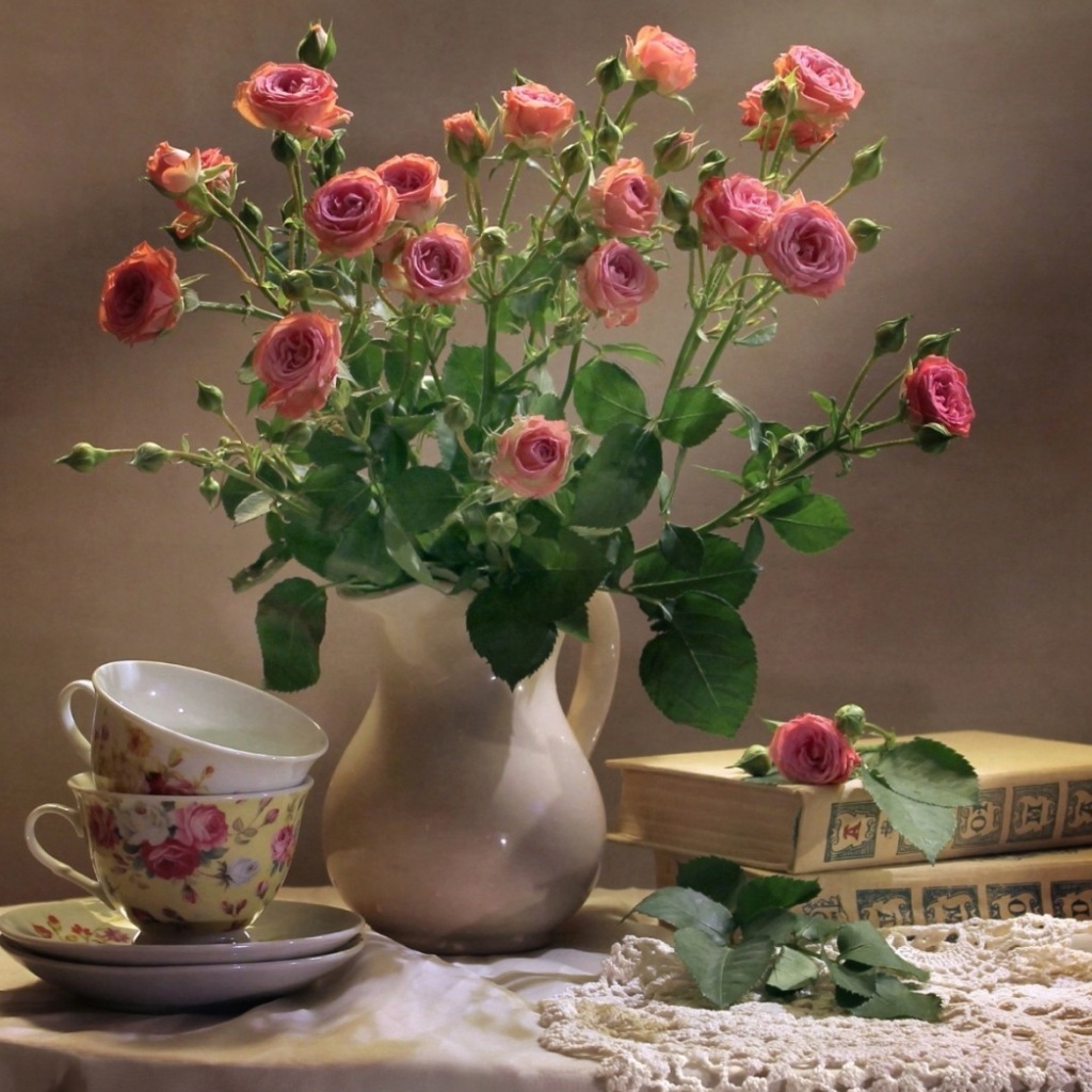 Still life of vintage books and roses wallpaper 1024x1024