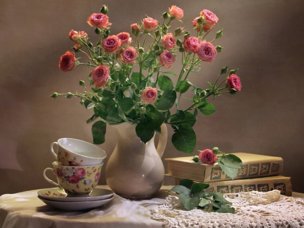 Still life of vintage books and roses wallpaper 1024x768