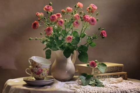 Still life of vintage books and roses wallpaper 480x320