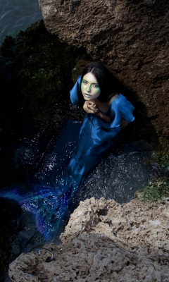 Blue Mermaid Hiding Behind Rocks wallpaper 240x400