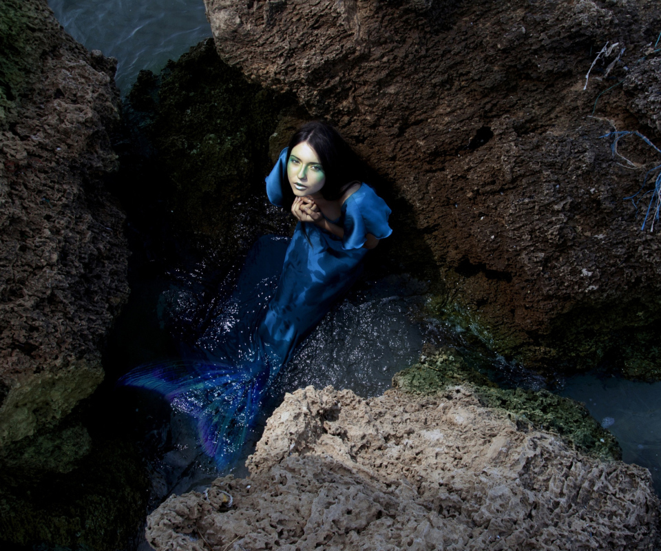 Blue Mermaid Hiding Behind Rocks wallpaper 960x800