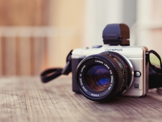 Обои Olympus DSLR Camera 320x240