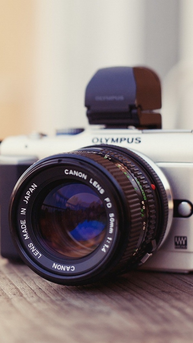 Das Olympus DSLR Camera Wallpaper 640x1136