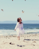 Little Girl At Beach And Seagulls screenshot #1 128x160