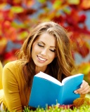 Girl Reading Book in Autumn Park wallpaper 128x160