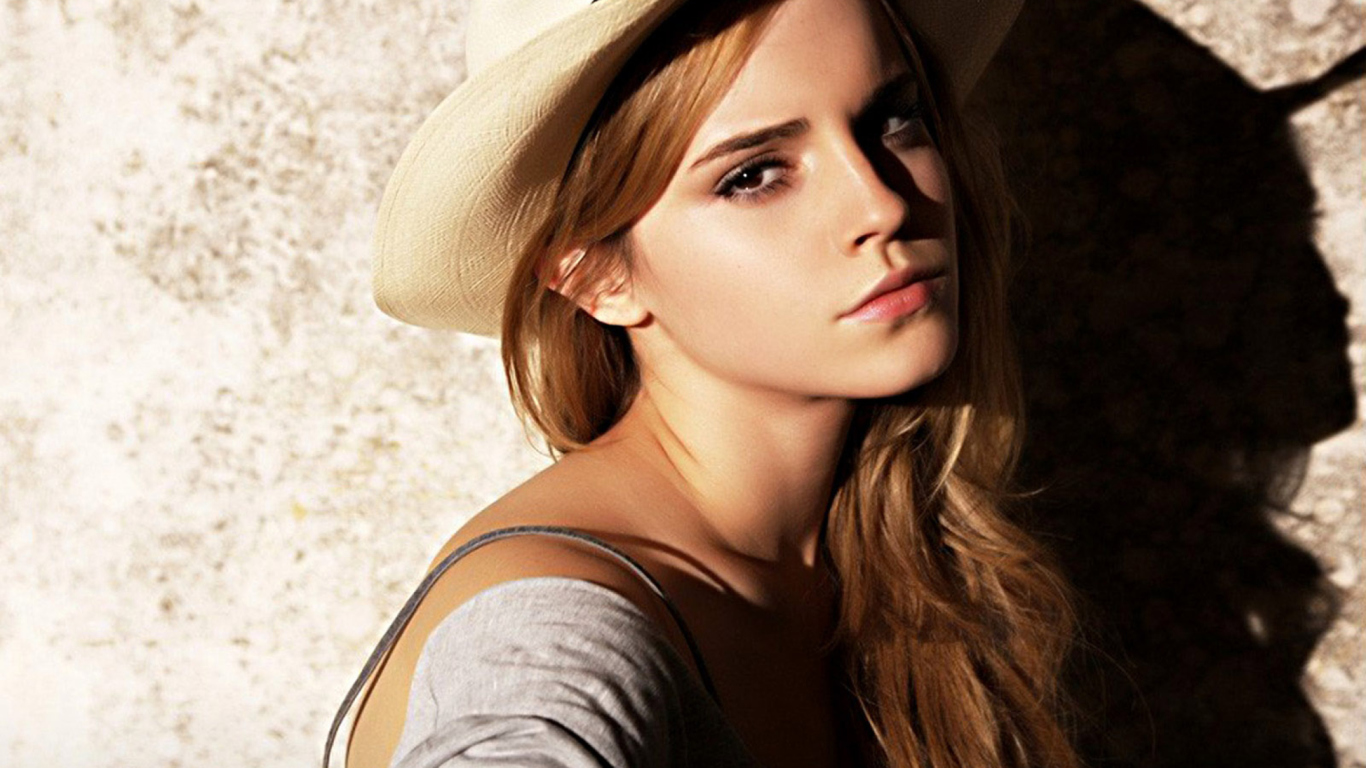 Обои Cute Emma Watson 1366x768