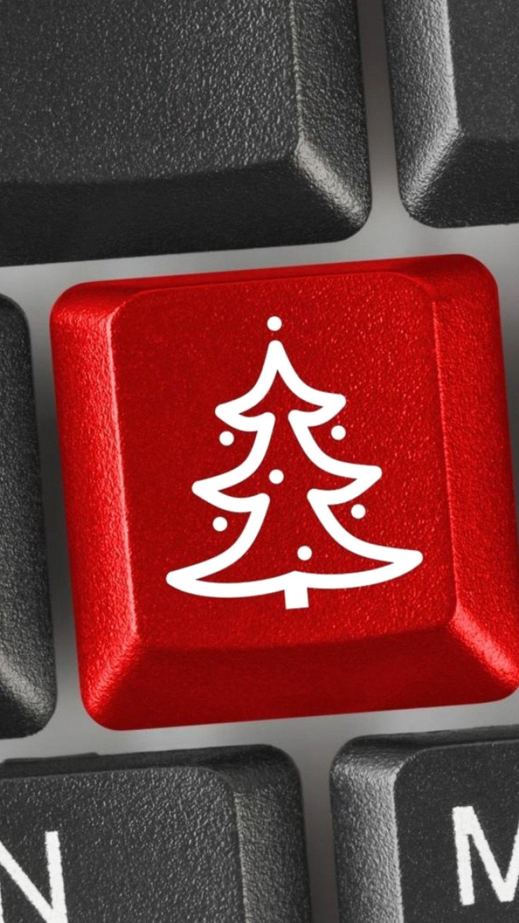 Fondo de pantalla Christmas Tree on Computer Keyboard 750x1334