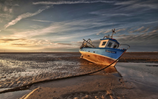 Old Ship On Sandbar Wallpaper for Android, iPhone and iPad