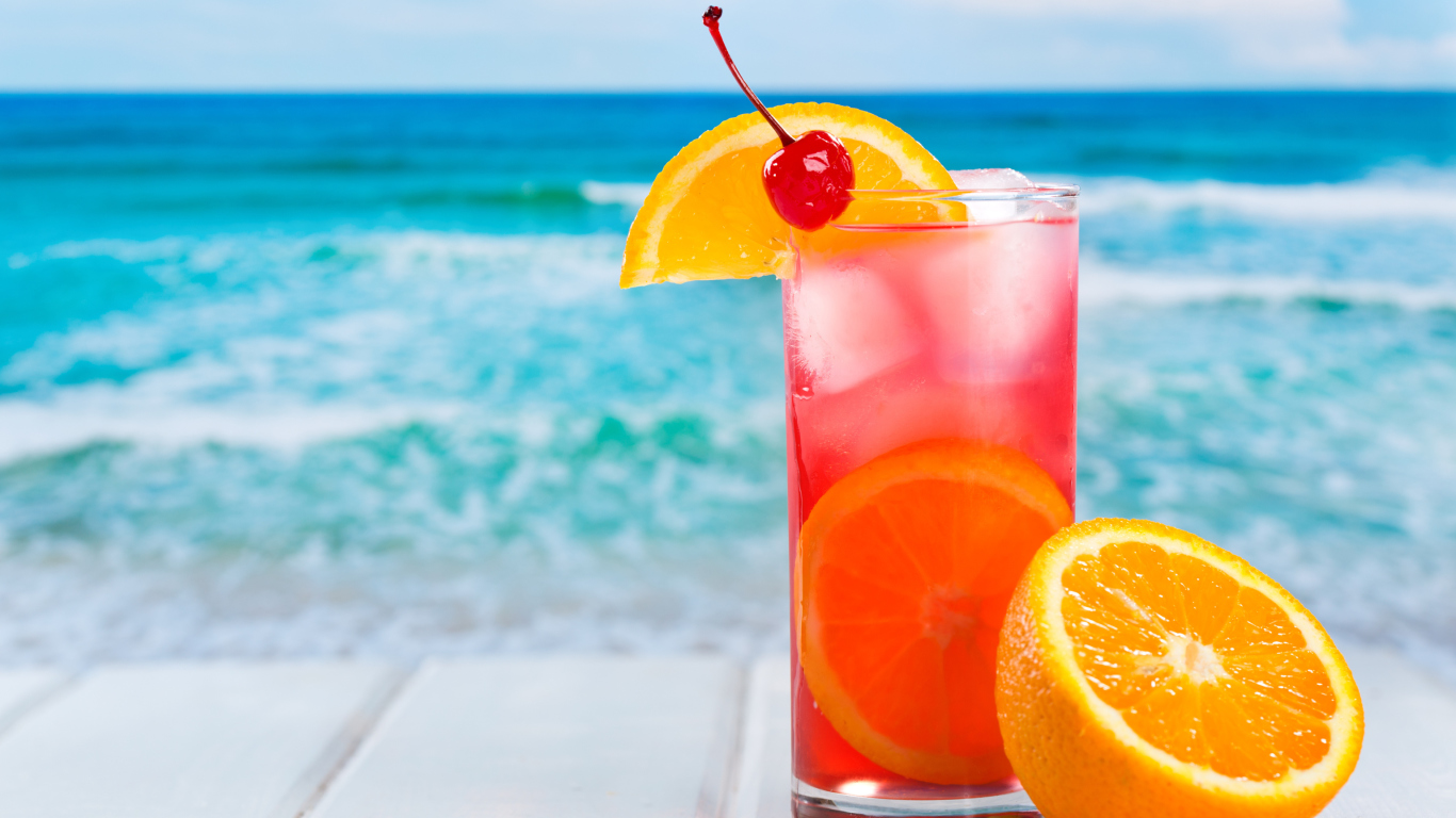 Tropical Paradise Cocktail With Cherry On Top screenshot #1 1366x768