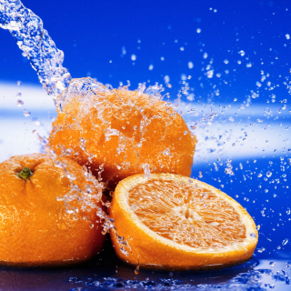 Kostenloses Juicy Oranges In Water Drops Wallpaper für 128x128