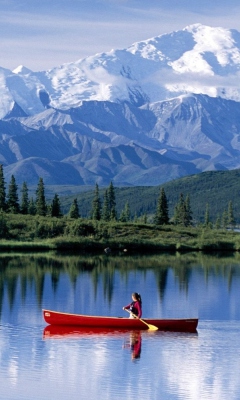 Canoe In Mountain Lake wallpaper 240x400