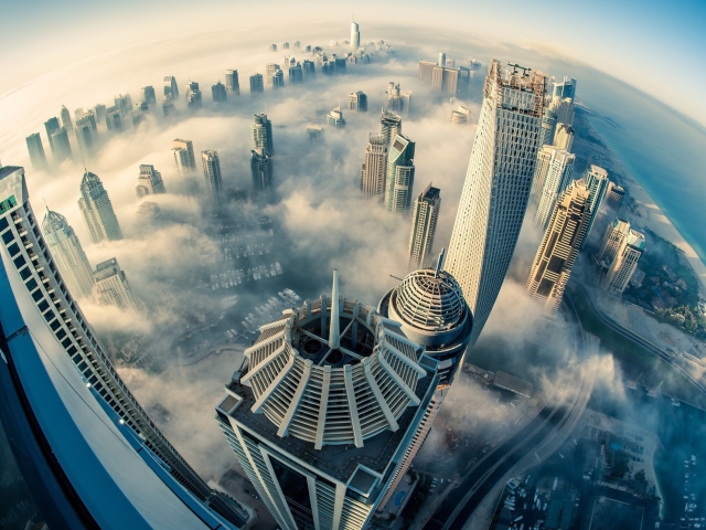 Обои UAE Dubai Clouds 640x480