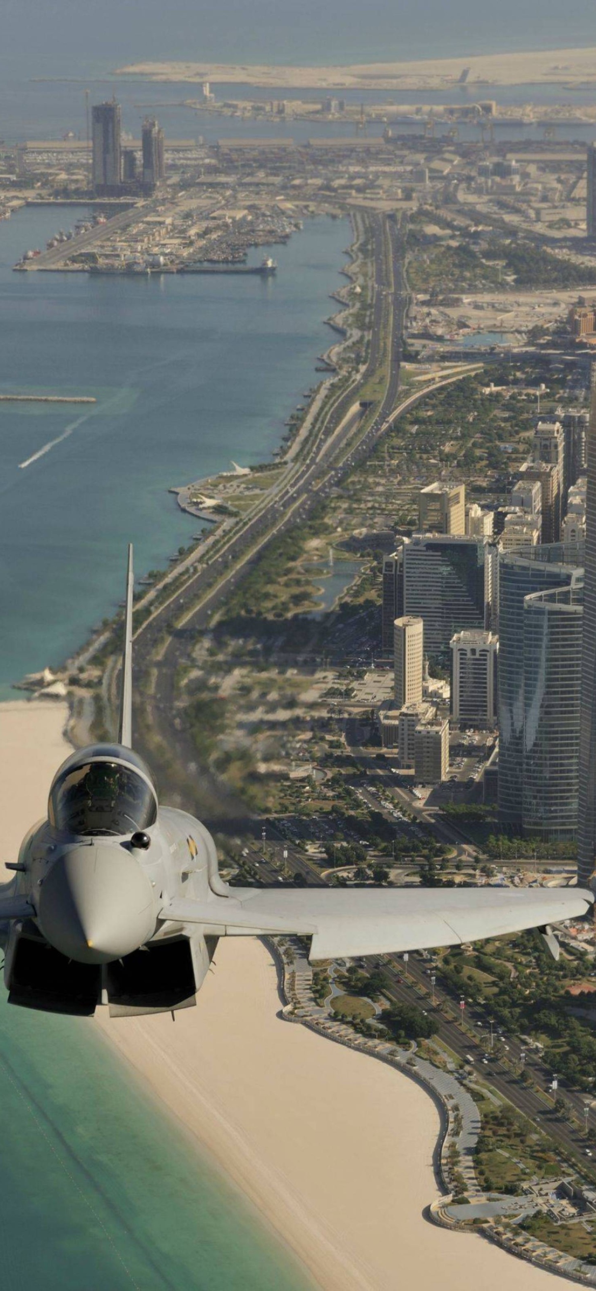 Eurofighter Typhoon Above Dubai wallpaper 1170x2532