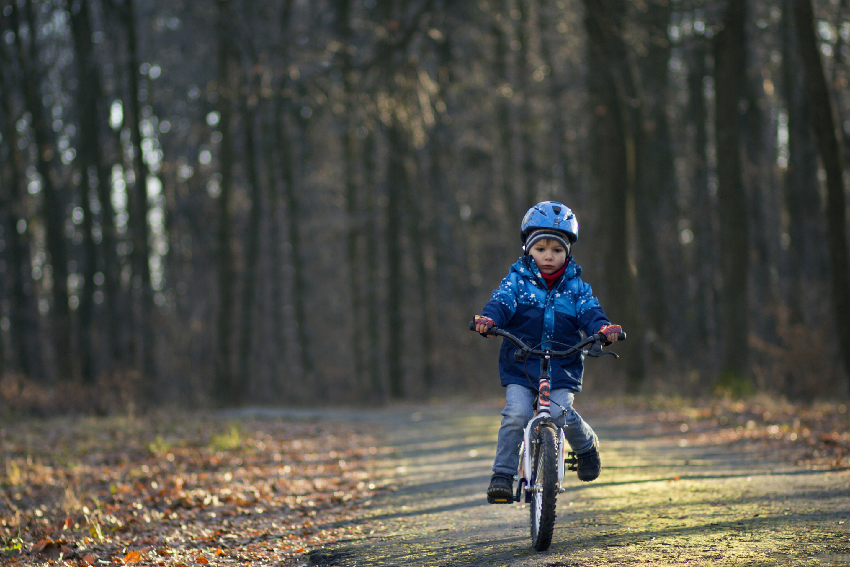 Обои Little Boy Riding Bicycle 2880x1920