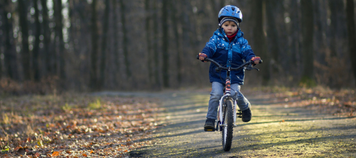 Little Boy Riding Bicycle wallpaper 720x320