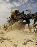 Fondo de pantalla Soldier with M60 machine gun 128x160