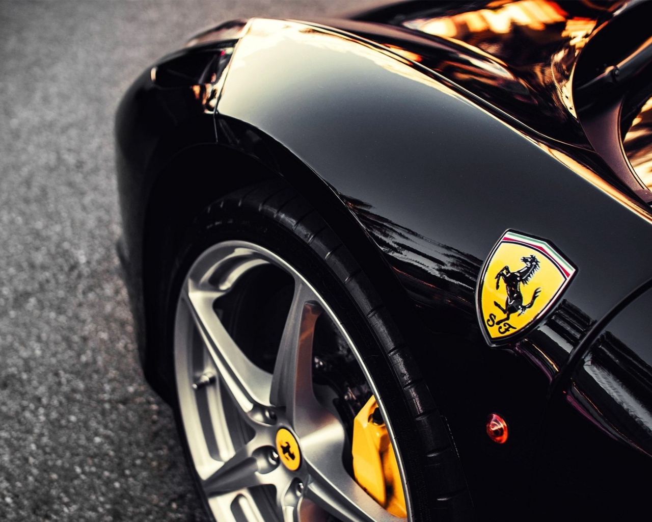 Black Ferrari With Yellow Emblem wallpaper 1280x1024