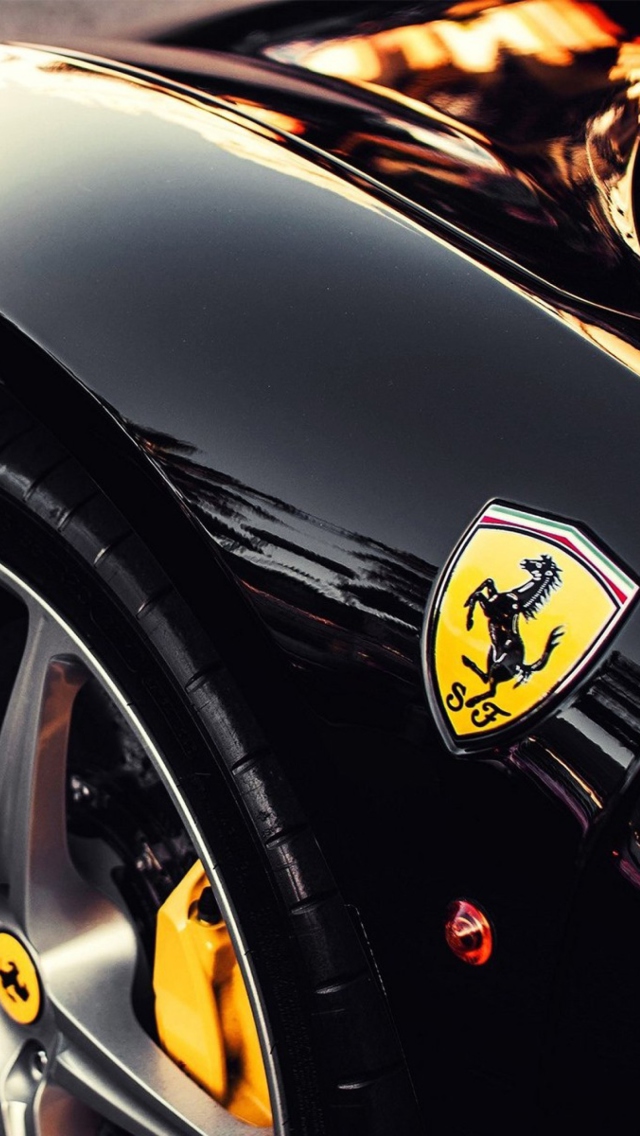 Das Black Ferrari With Yellow Emblem Wallpaper 640x1136
