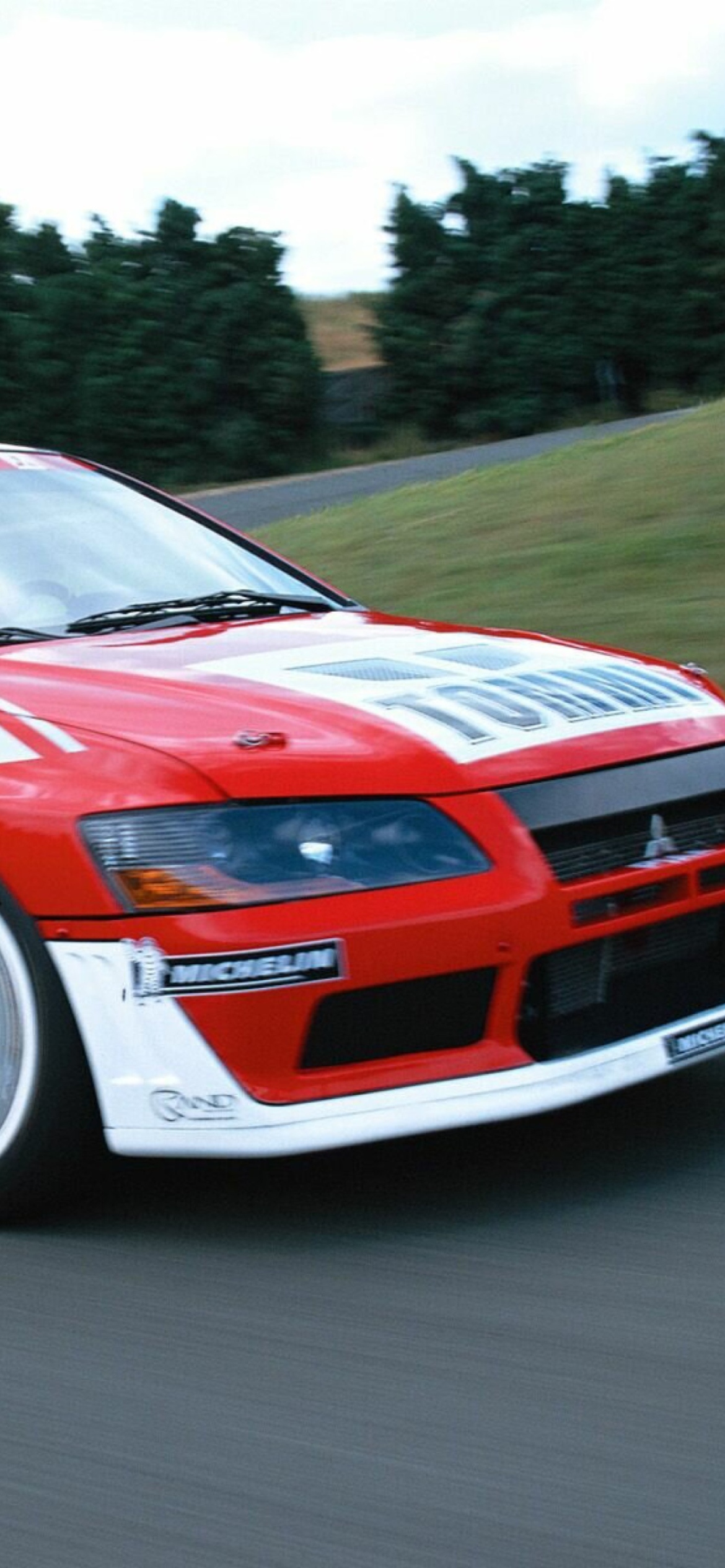 Mitsubishi Lancer Evolution WRC wallpaper 1170x2532