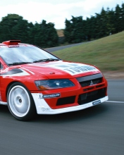Обои Mitsubishi Lancer Evolution WRC 176x220