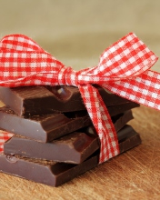 Chocolate And Red Bow wallpaper 176x220
