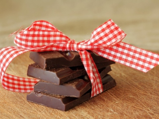 Chocolate And Red Bow wallpaper 320x240