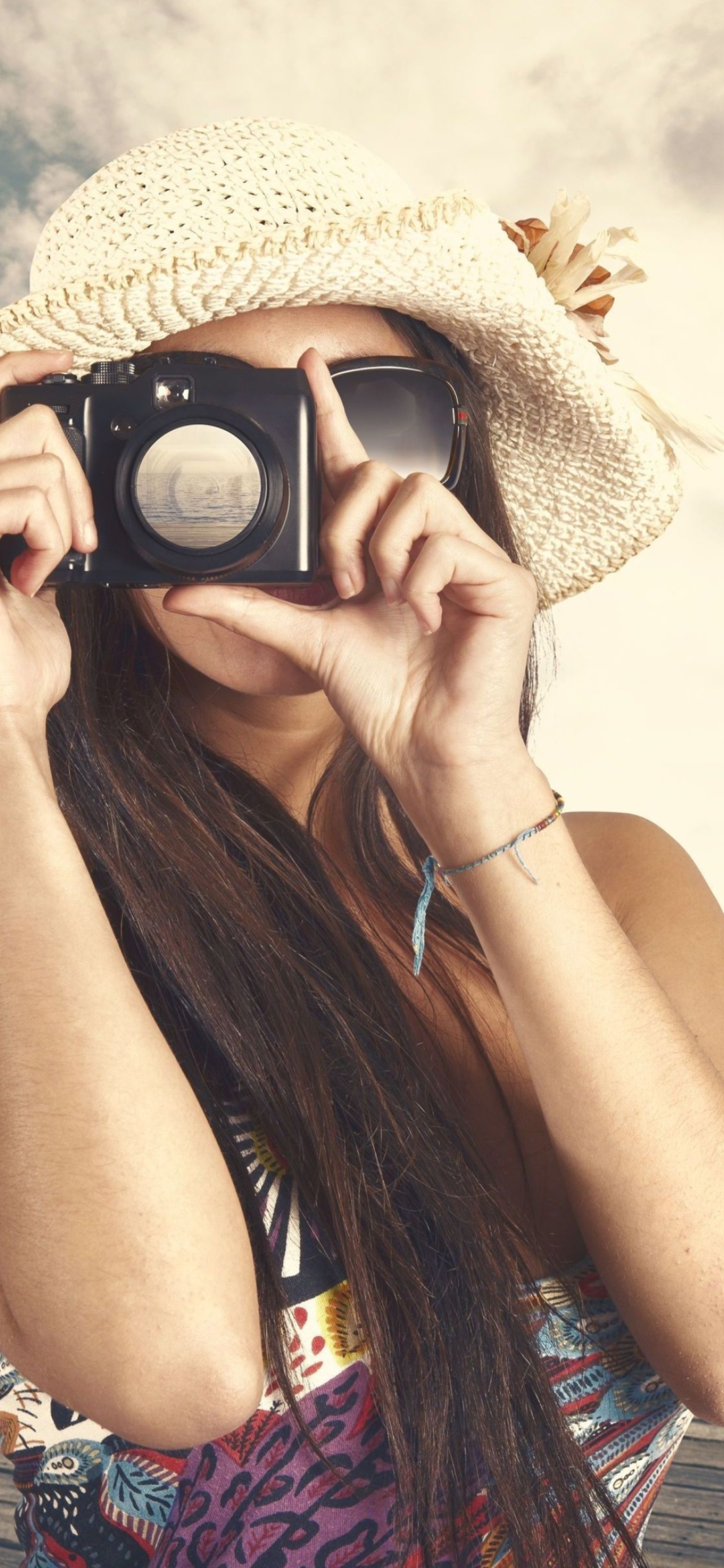 Cute Photographer In Straw Hat wallpaper 1170x2532