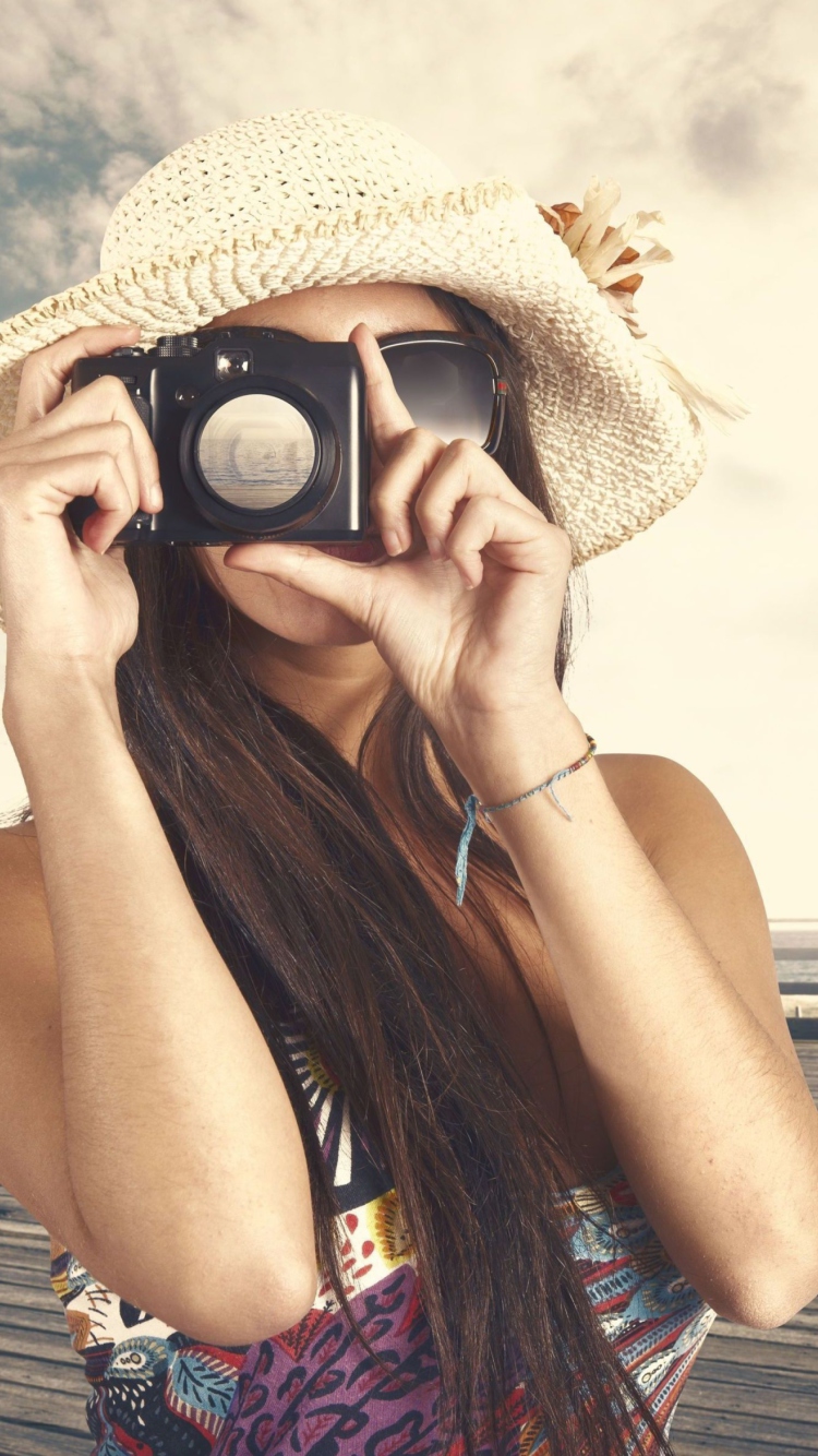 Cute Photographer In Straw Hat wallpaper 750x1334