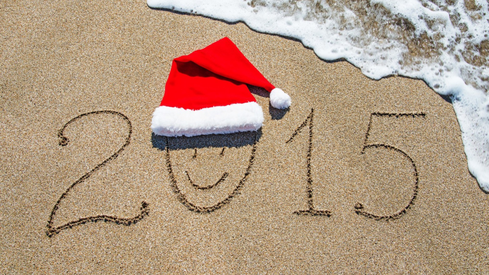 Happy New Year on Sand wallpaper 1600x900
