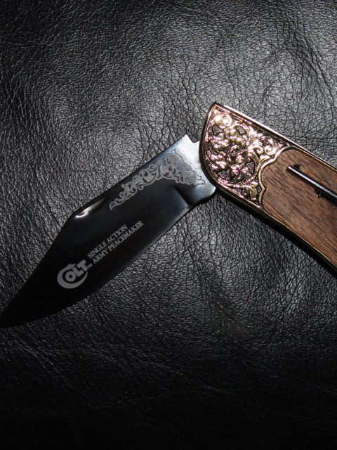 Обои Knife 480x640
