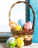 Easter eggs in basket wallpaper 128x160