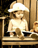 Обои Little Girl Reading Book 128x160