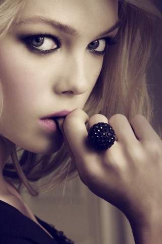 Обои Fashion Girl With Big Black Ring 320x480