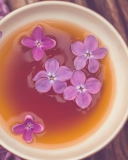 Screenshot №1 pro téma Cup Of Tea And Lilac Flowers 128x160