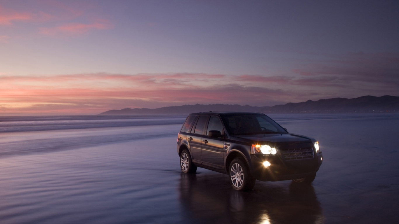 Sfondi Car On Water At Sunset 1366x768