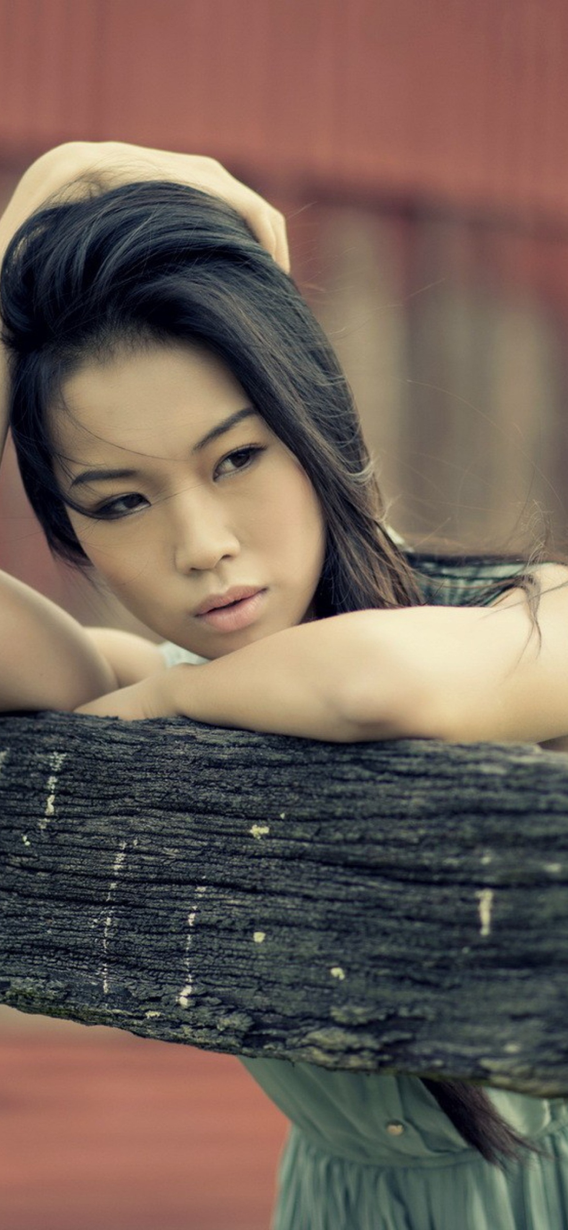 Asian Model Posing wallpaper 1170x2532