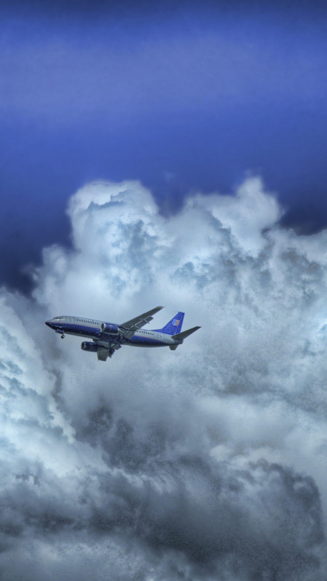 Airplane In Clouds wallpaper 640x1136
