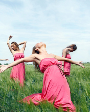 Sfondi Girl In Pink Dress Dancing In Green Fields 176x220