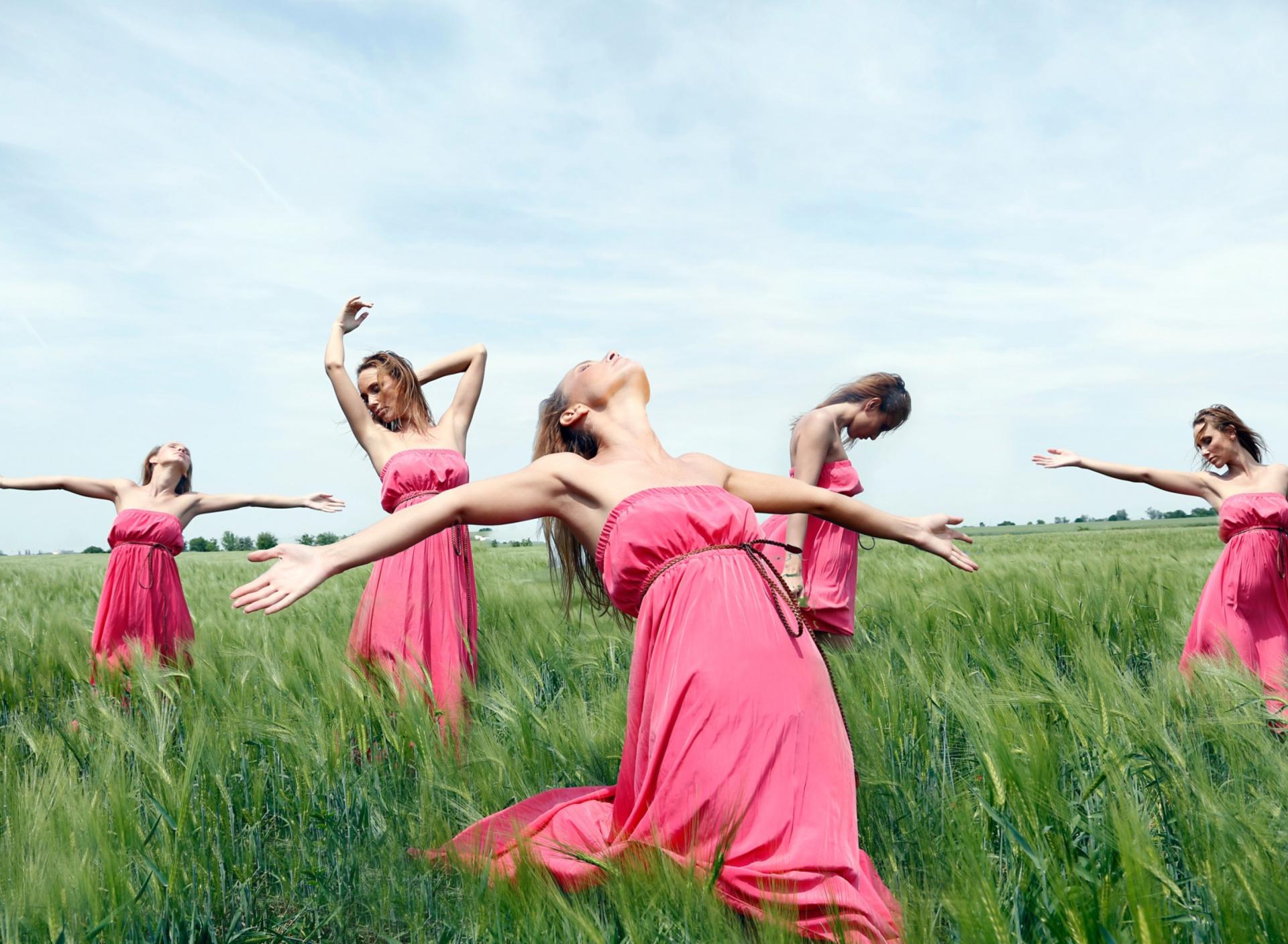 Sfondi Girl In Pink Dress Dancing In Green Fields 1920x1408
