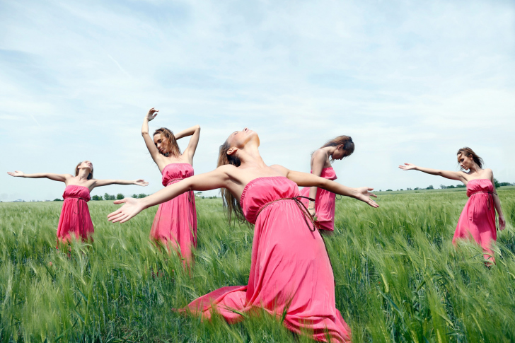 Girl In Pink Dress Dancing In Green Fields wallpaper