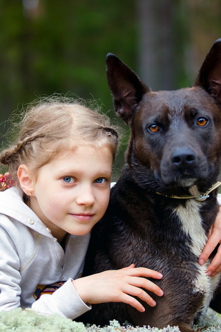 Dog with Little Girl wallpaper 320x480