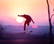 Screenshot №1 pro téma Sunset Skateboard Jump 176x144