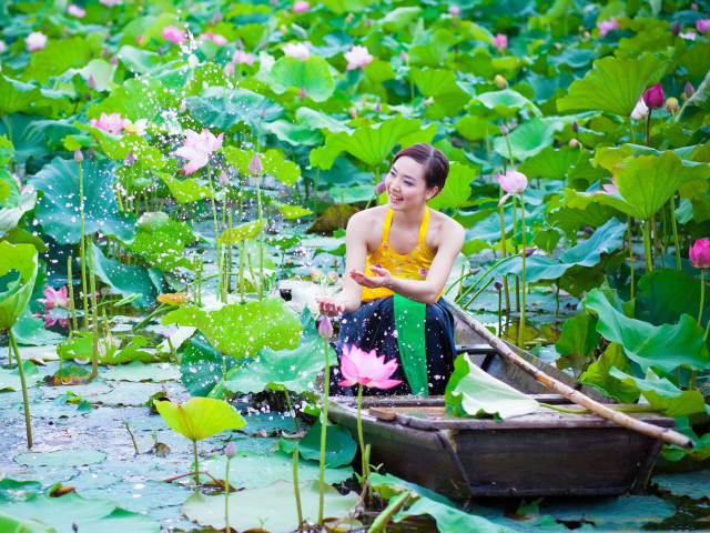 Cute Asian Girl In Boat wallpaper 640x480