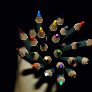 Colorful Pencils In Hand - Obrázkek zdarma pro iPad Air