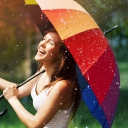 Happy Girl With Rainbow Umbrella Under Summer Rain wallpaper 128x128